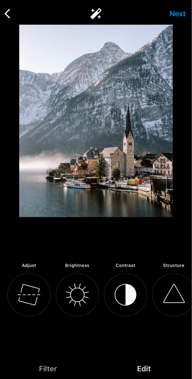آپلود عکس در اپلیکیشن اینستاگرام.  صفحه ویرایش گزینه هایی را برای تنظیم روشنایی، کنتراست و غیره عکس نشان می دهد.